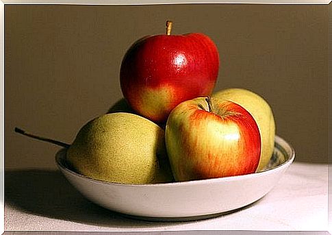 An apple on a plate