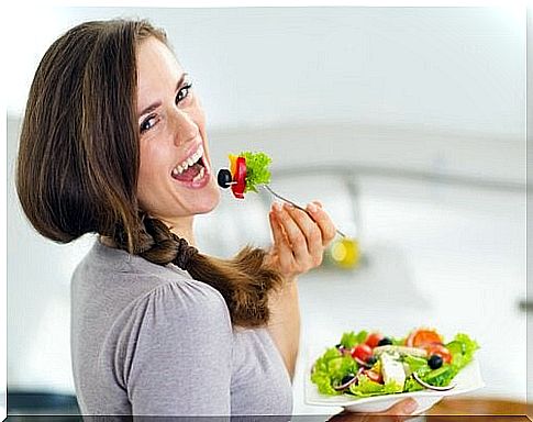 Woman eating a salad