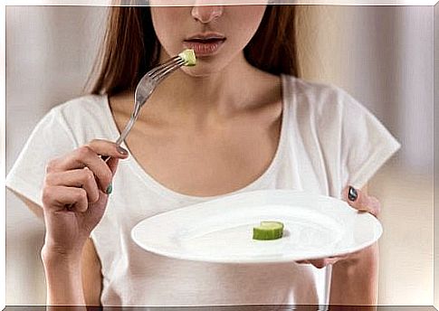 Woman with an empty plate