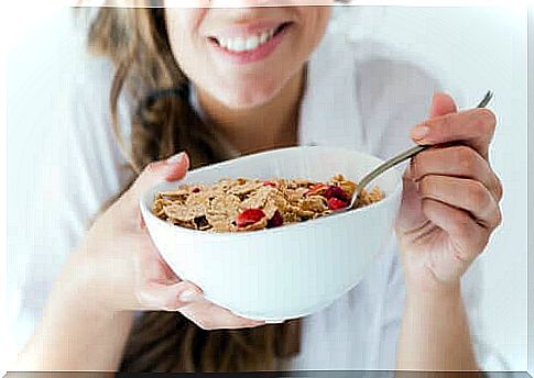 Woman eating cereal