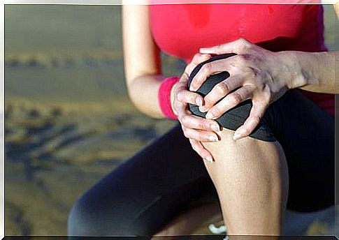 A woman with a sore knee