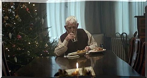 Elderly man at the table