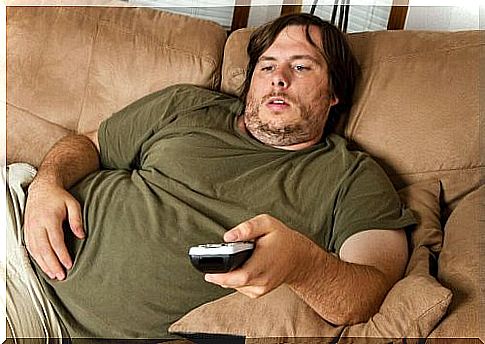 obesity obese man on the couch