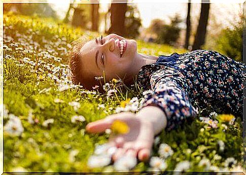 Girl on the meadow and positive thinking